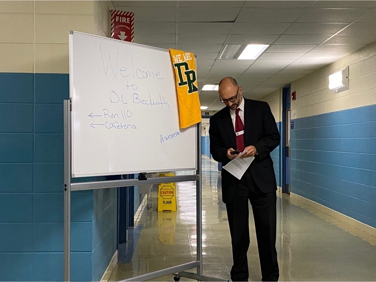 principal with open house sign